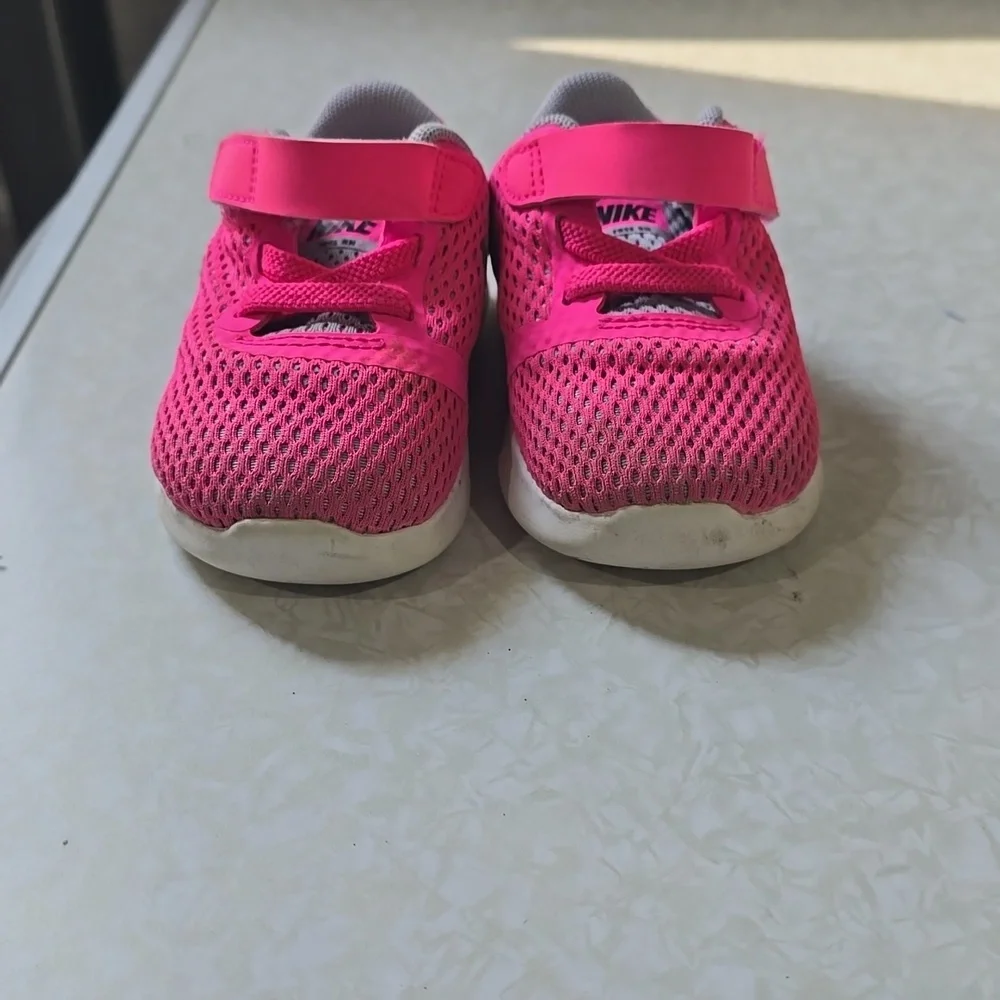 Pink and gray‎ Nike sneakers size 4C